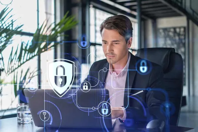 Handsome Businessman Suit Workplace Working With Laptop Defend Customer Cyber Security Concept Clients Information Protection Brainstorm Padlock Hologram Office Background X - Certified Cybersecurity Professional study guide