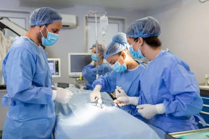 Surgeons Operating Lighting Equipment Male Female Doctors Are Wearing Blue Scrubs They Are Working Hospital 1 X - Certified Cardiac Surgeon study guide