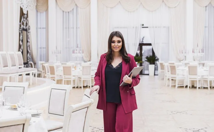 Event Manager With Laptop Banquet Hall X - Certified Event Designer study guide
