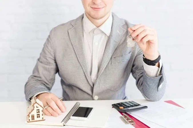 Smiling Agent Giving Keys1 1 - Collection Industry Professional Certification study guide