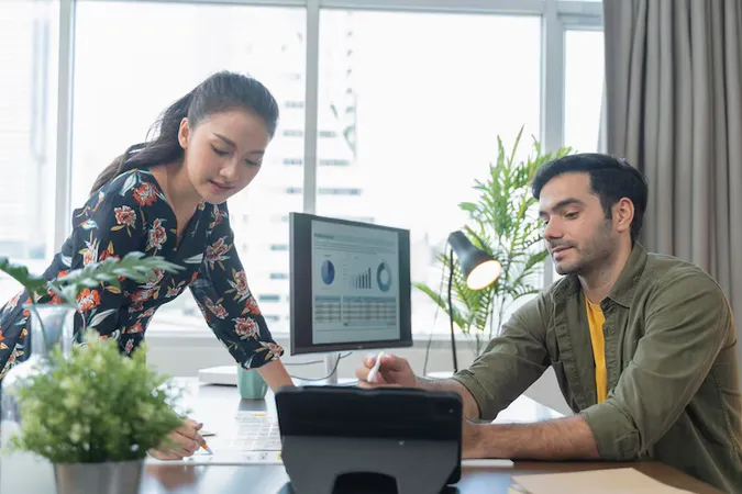 Young Asian Caucasian Adult Creative Partnets Working With New Project Discussion Brainstorm Office Day Timemeeting Designer Partners Conversation With Focus Concentrate - Certified Implementation Specialist study guide