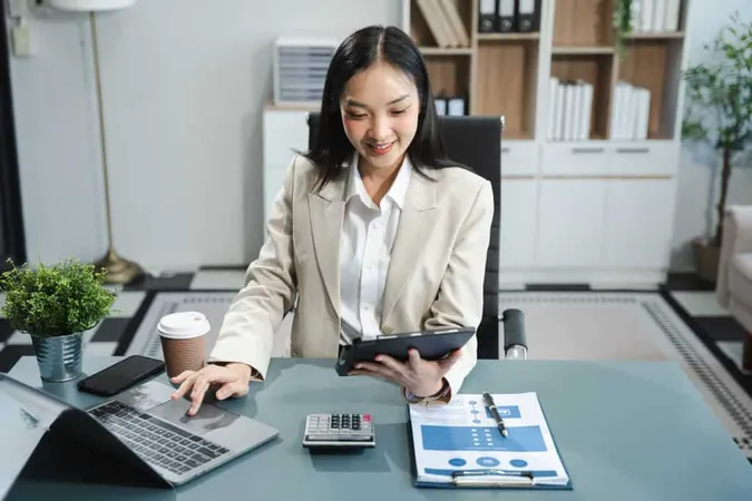 Business Woman Financial Data Analysts Working With Smartphone Laptop Computers Data Graphs Together Plan Analyzing Projects Office X - Certified Payroll Manager study guide