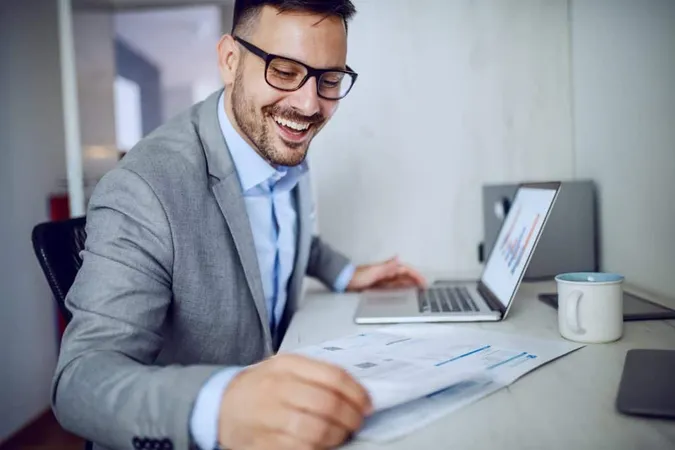 Businessman Doing Paperwork 2 X - Certified Payroll Specialist study guide