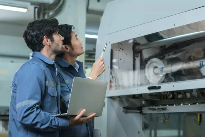 Male Asian Caucasian Engineer Professional Having Discussion Standing Consult Machine Factory Two Expert Coworker Brainstorm Explaining Solves Process Cnc Operate Machine X - Certified Production Technician study guide