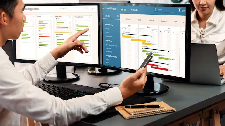 Project Management Team Coordinating Update Project Planned Schedule Computer Using Gantt Chart Software Office Business People Planning Time Deadline Company Task Tr - Functional Capacity Evaluator Certification study guide