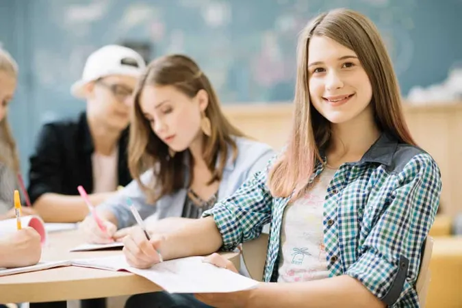 Smiling Girl Posing With Classmates X - Higher School Certificate test study guide