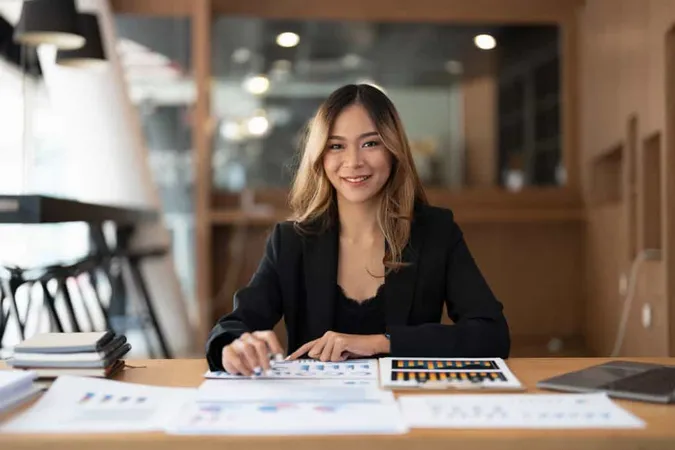 Portrait Businesswoman Working Office X - Accredited Business Accountant study guide