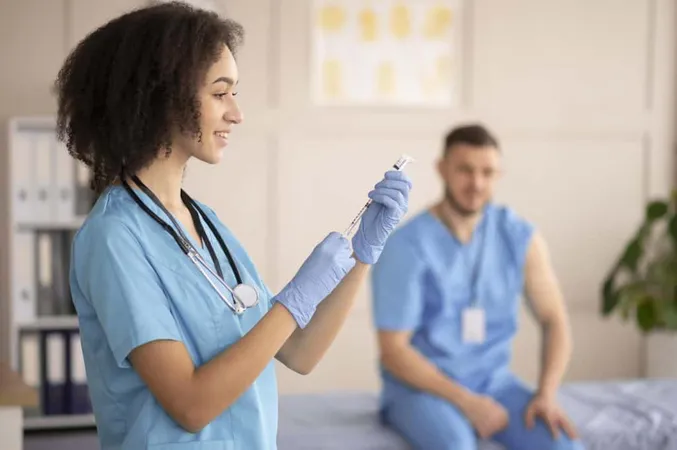 Female Doctor Preparing Vaccination Her Colleague X - ASA (American Society of Anesthesiologists) Board Certification study guide