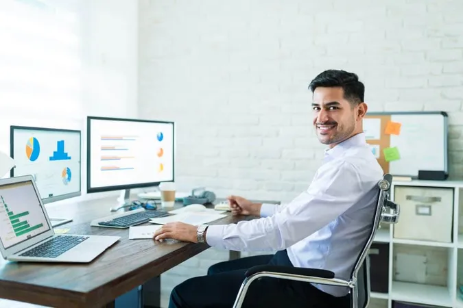 Smiling Attractive Sales Professional Making Eye Contact While Sitting Desk X - ACORD Certified Expert study guide