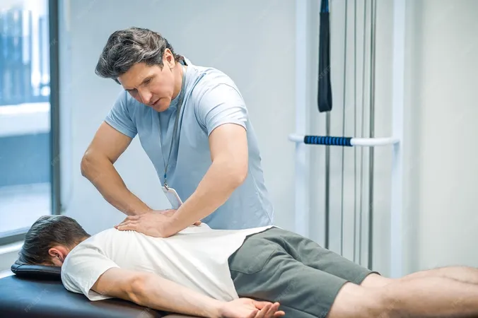 Back Massage Male Patient Having Session Rehabilitation Back Massage - Certified Applied Kinesiologist study guide