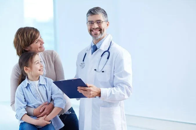 Happy Doctor Holding Clipboard With Patients X - Applied Knowledge Test study guide