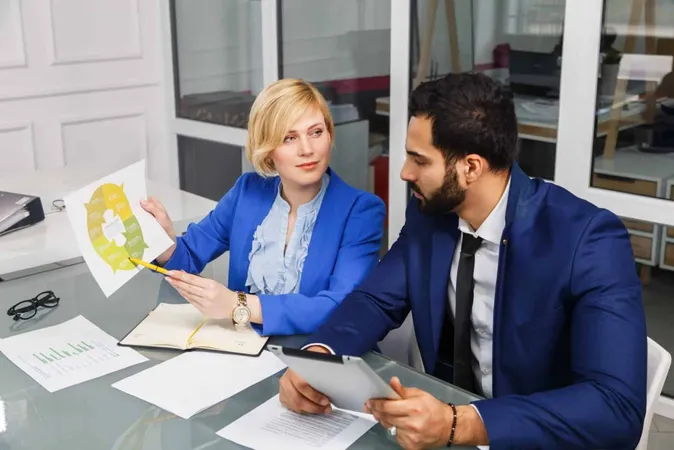 Analytic Manager Team Working Process Bearded Man Blonde Businesswoman Dressed Suits Work With Documents White Office Interior X - Associate in Risk Management study guide