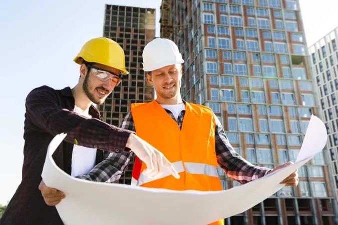 Medium Shot Low Angle View Engineer Architect Supervising Construction X - American Society of Civil Engineers Certification study guide