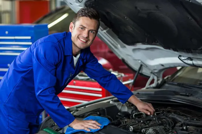 Mechanic Servicing Car Engine 1 - ASE study guide