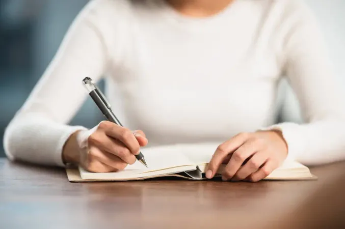 Close Up Female Student Sit Exam - Blog study guide