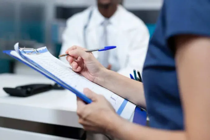 Closeup Patient Mother Writing M - Blog study guide