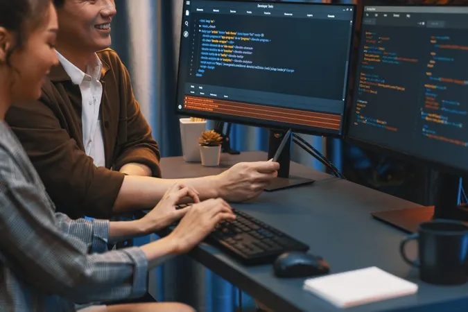 It Developers Discussing With Point Website Coding System Infobahn X - Certified Application Specialist study guide