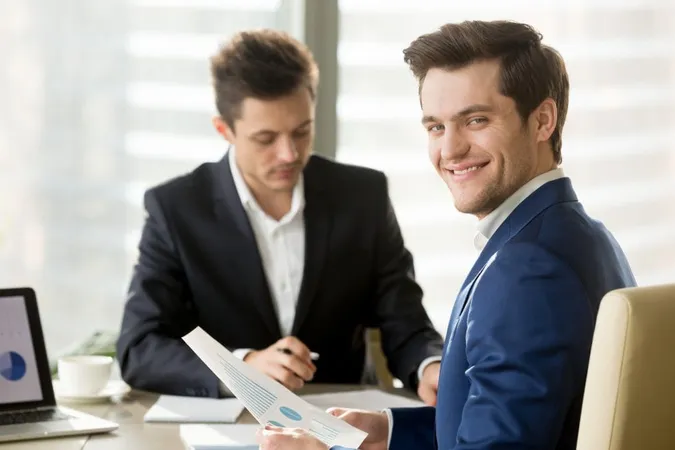 Smiling Businessman Financial Analyst Broker Looking X - Certified Accounting Technician study guide