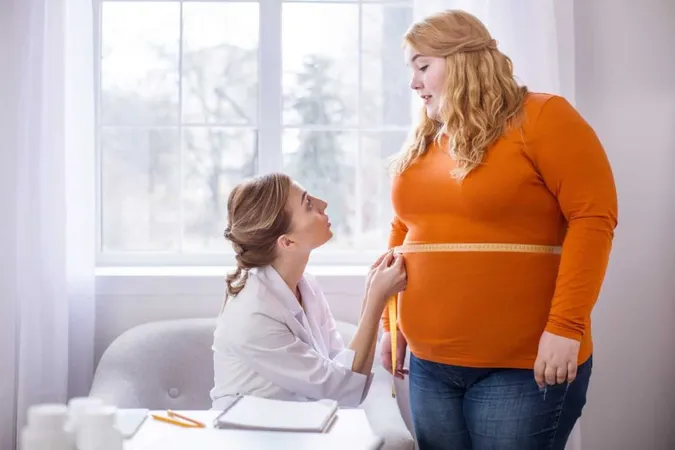 Bad Results Displeased Professional Doctor Talking With Fat Woman Measuring Her X - Certified Bariatric Nurse study guide