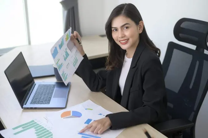 Young Beautiful Business Woman Working Laptop With Documents Modern Office X - Certified Corporate Accountant study guide