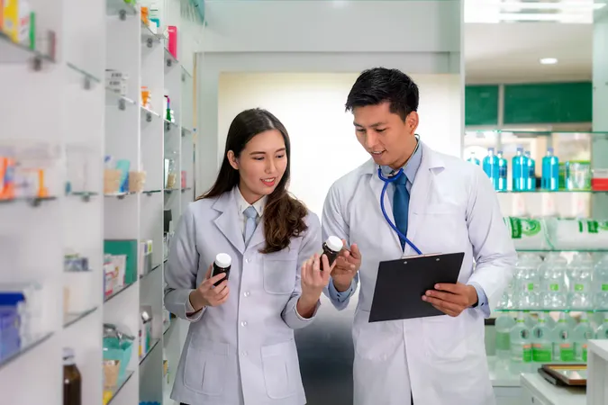 Asian Young Woman Man Pharmacist With Lovely Friendly Smile Checking Inventory Pharmacy Drugstore - Certified Consultant Pharmacist study guide