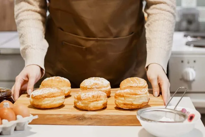 Woman Prepares Fresh Donuts With Jam Home Kitchen Cooking Traditional Jewish Hanukkah Sufganiyot X - Certified Doughnut Maker study guide