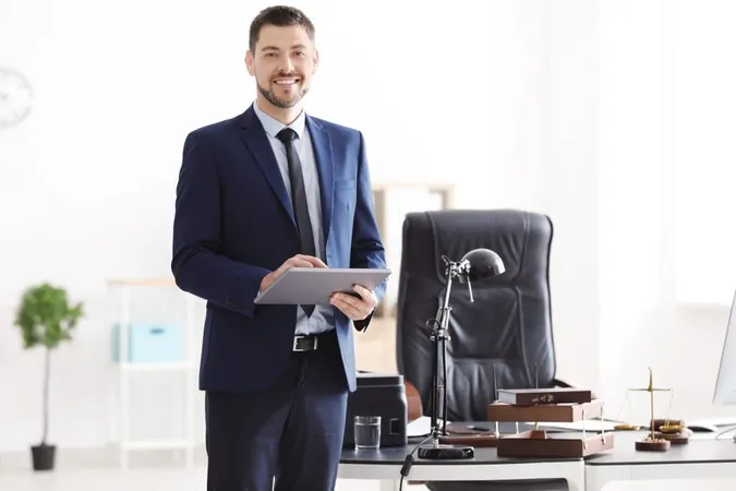 Young Male Notary With Tablet Office X - Certified Executive Director study guide