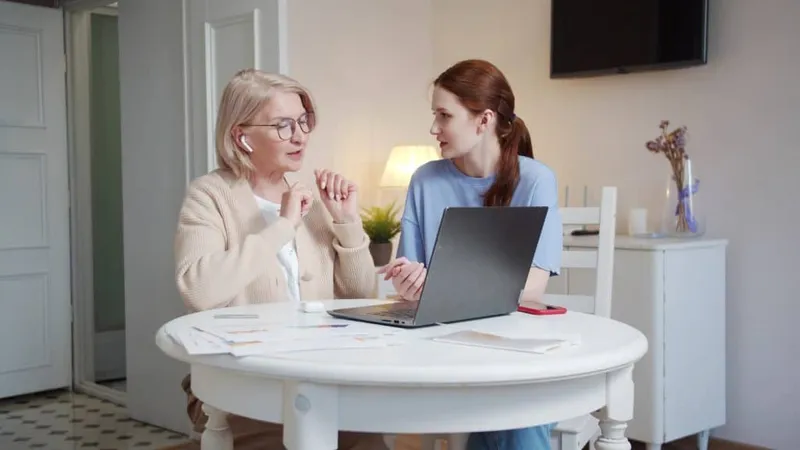 Businesswoman Using Laptop Home X - Certified Assisted Living Administrator study guide