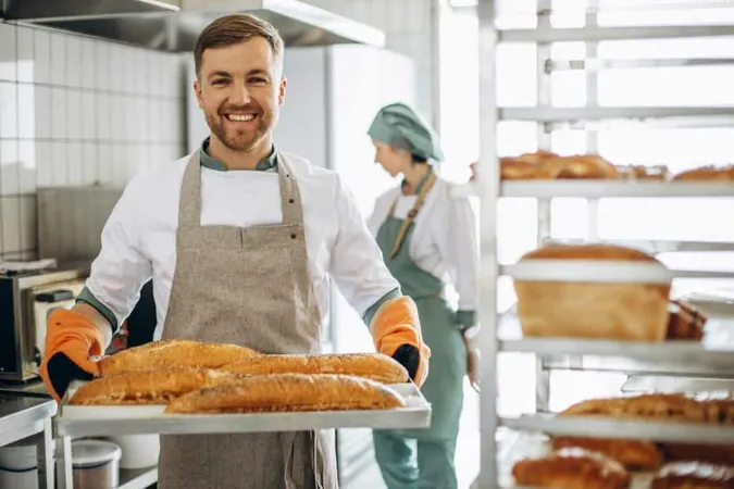 Man Baker With Fresh Bread Baker House X - Certified Baker study guide