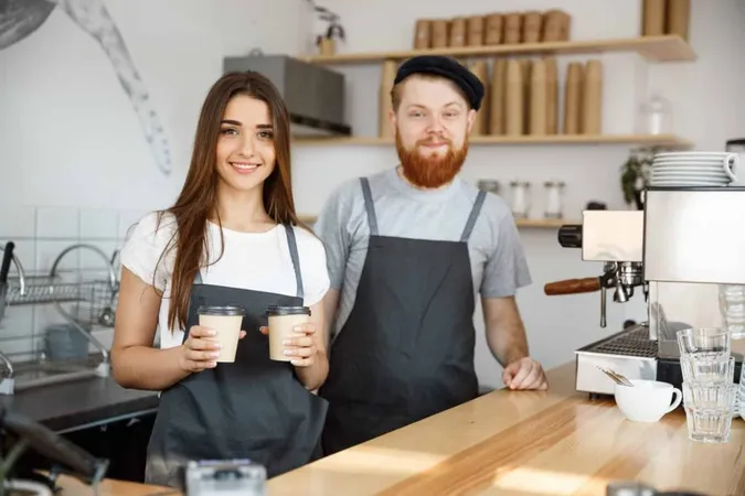 Coffee Business Concept Positive Young Bearded Man Beautiful Attractive Lady Barista Couple Giving Take Away Cup Coffee Custome Modern Coffee Shop X - Certified Barista study guide