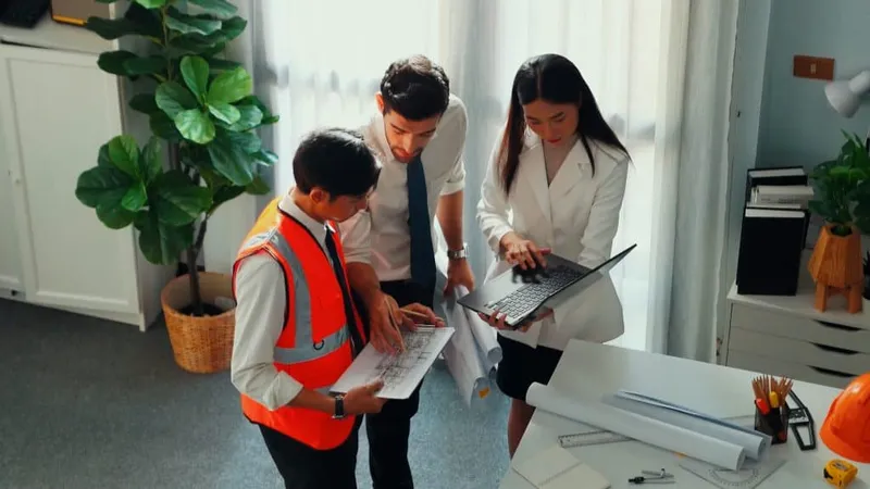 Top View Skilled Engineer Team Looking Blueprint Together Alimentation X - Certified Environmental, Safety and Compliance Officer study guide