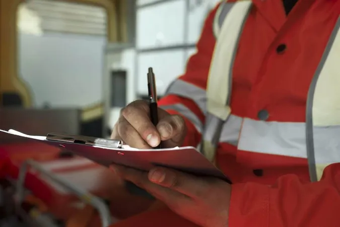 Side View Man Taking Notes Ambulance Car X - Certified Fire Investigator study guide