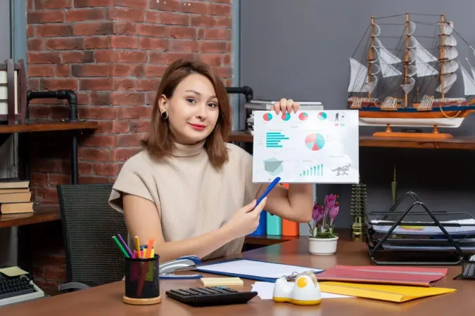 Front View Pretty Woman Showing Diagrams Working Office - Certified Financial Modeler study guide