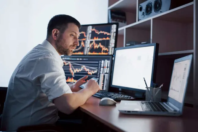 Busy Working Day Close Up Young Businessman Looking Monitor While Sitting Desk Creative Office X - Certified Fintech Practitioner study guide