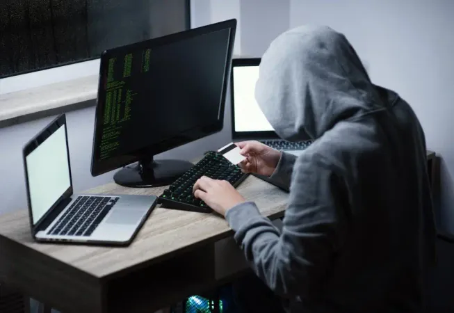 Teenager Boy Playing Computer Laptop X - Certified Fraud Specialist study guide
