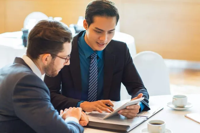 Two Business Partners Discussing Issue 2 X - Certified General Appraiser study guide