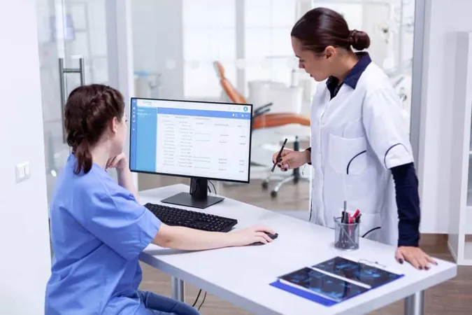 Stomatolog Nurse Tooth Clinic Checking Patient Appointment Looking Computer Monitor Stomatology Assistant Teeth Doctor Discussing Reception Dental Office 1 X - Certified Inpatient Coder study guide