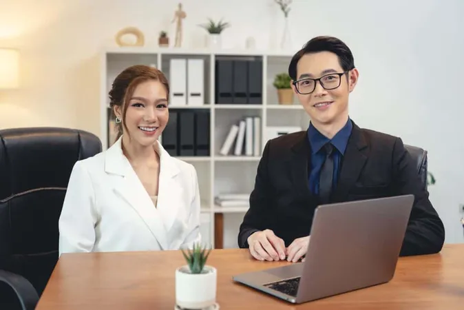 Asian Businesspeople Confident Relaxing Office Meeting Room Business Team Concept X - Certified Internet Recruiter study guide