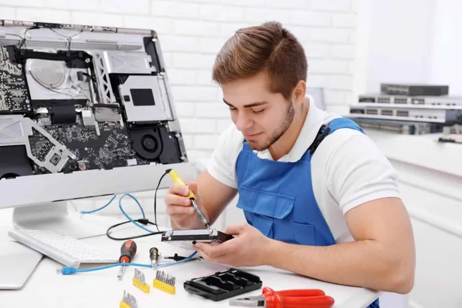 Young Repairer Working With Soldering Iron Service Center X - Certified IPC Specialist study guide