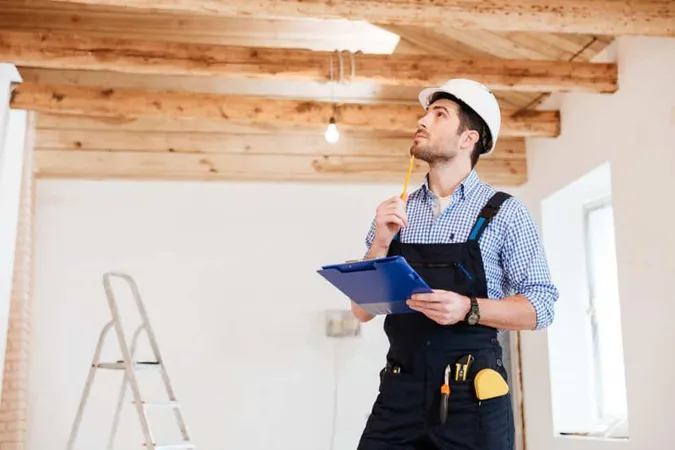 Young Pensive Specialist Builder Examines His Working Space 1 X - Certified Lighting Consultant study guide