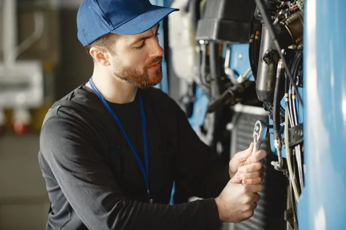 Car Mechanic Repairs Blue Car Garage With Tools X - Certified Lubrication Specialist study guide