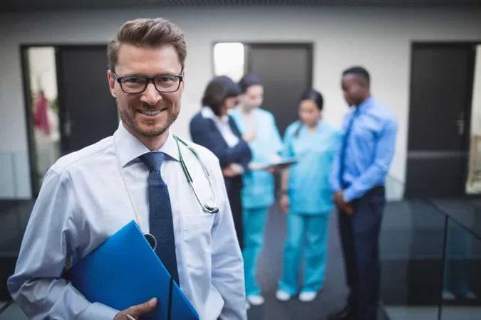 Doctor Holding Medical Report Hospital Corridor X - Certified Medical Director study guide