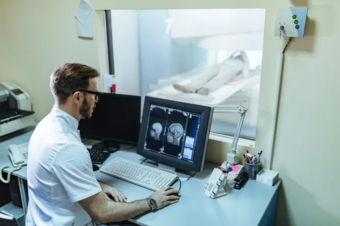 Male Radiologist Analyzing Mri Scan Results Patient Computer Monitor Control Room X - Certified Medical Dosimetrist study guide