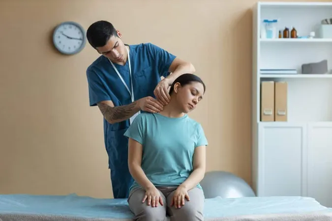 Doctor Helping Patient Rehabilitation 2 X - Certified Manual Therapist study guide