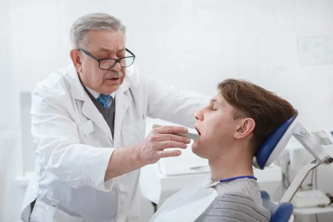 Experienced Senior Dentist Examining Teeth Patient X - Certified Myofunctional Therapist study guide