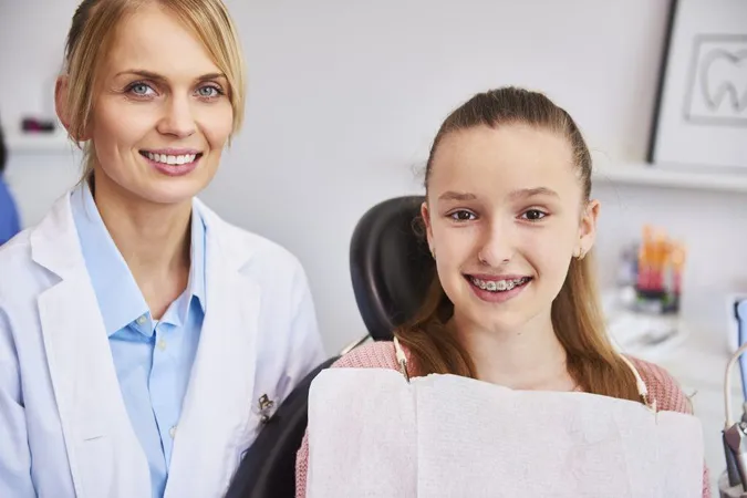Smiling Female Orthodontist Child Dentist S Office X - Certified Orthodontic Assistant study guide