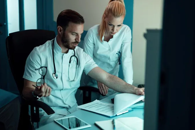 Two Doctors Cooperating While Analyzing Medical Data Patient Hospital - Certified Professional Coder study guide