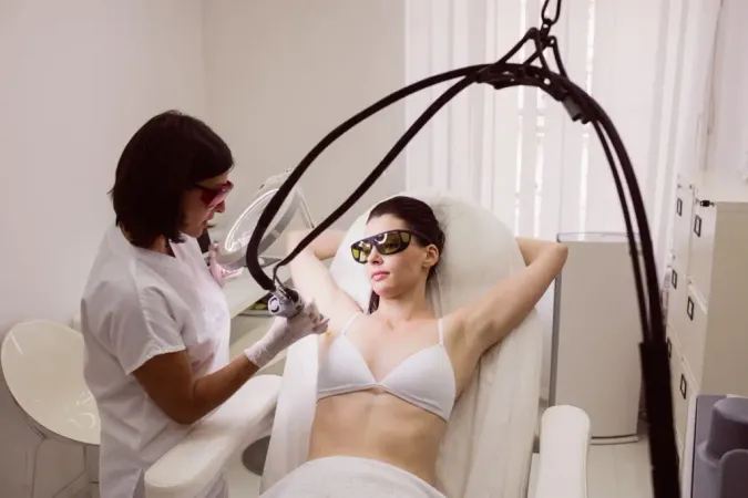 Doctor Performing Laser Hair Removal Female Patient Skin X - Certified Professional Electrologist study guide