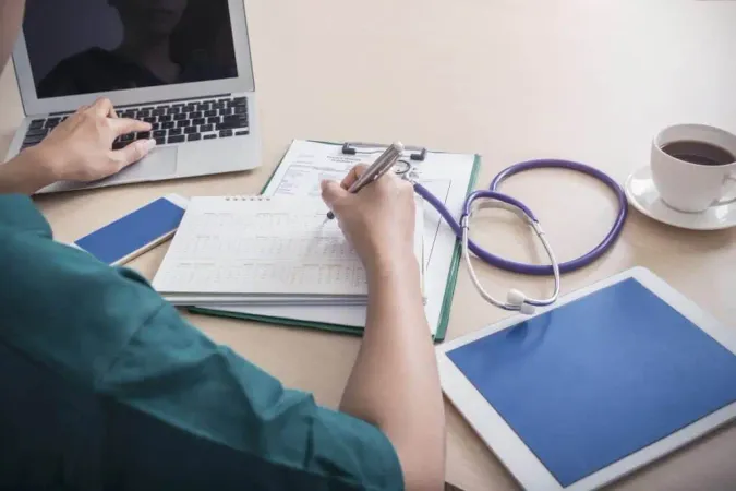 Healthcare Medical Concept Doctor Working With Laptop Mobile Tablet Stethoscope C X - Certified Public Health Administrator study guide