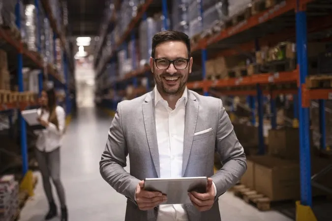Cheerful Successful Middle Aged Manager Businessman Holding Tablet Computer Large Warehouse Organizing Distribution X - Certified Purchasing Manager study guide